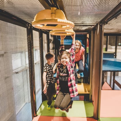 young children on ninja obstacle course at house of air