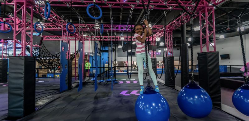HOA young girl on the ninja obstacle course San Antonio