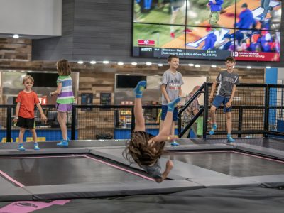 young boy jumping on the trampoline at HOA
