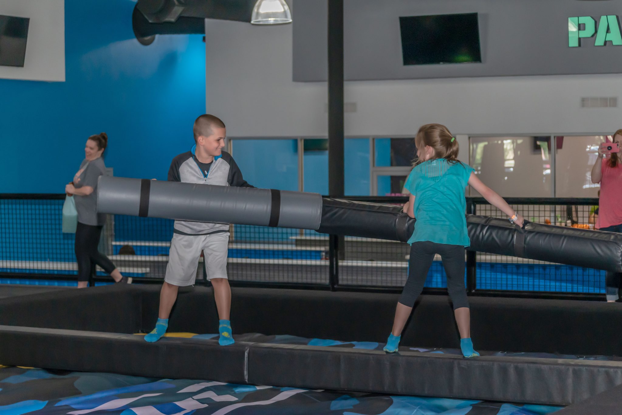 young male and female joust at San Antonio HOA
