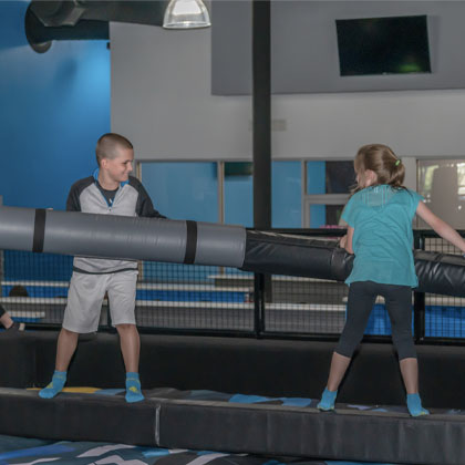 young boy and girl at the the jousting center HOA
